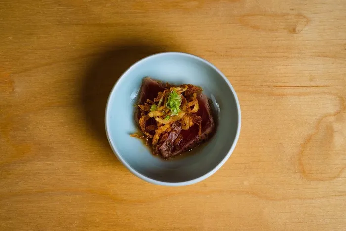 Tuna crudo with crispy onions